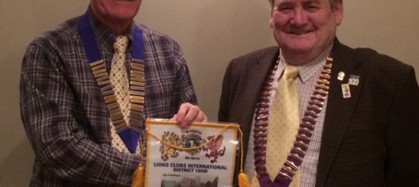 Lion Keith Mead with District Gov. Godfrey Morris